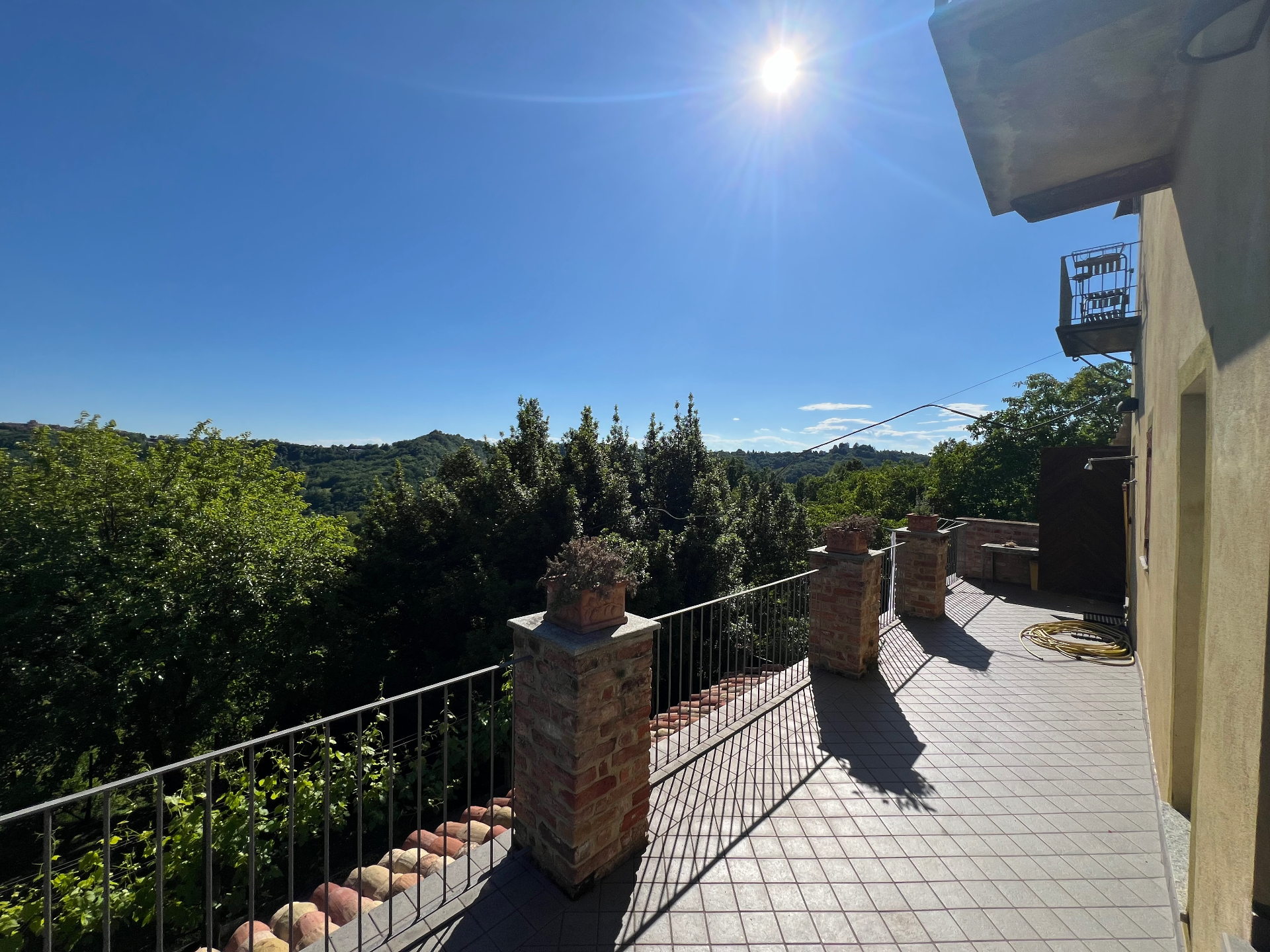 Panoramic terrace at the Cocconato property overlooking the Monferrato hills